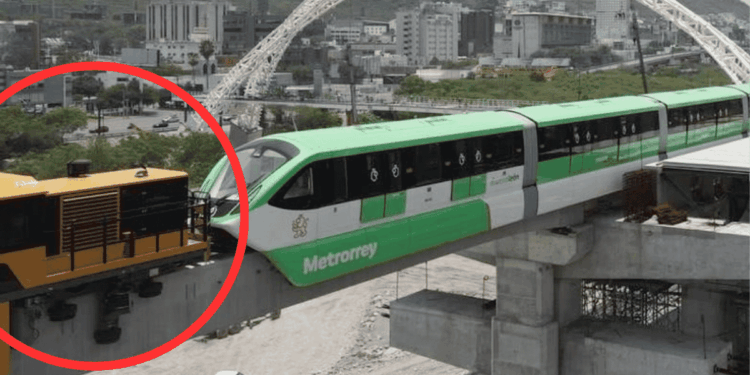 Elevated Green-and-white Metro Train Beside a Yellow Maintenance Vehicle at a Construction Site. › La Sierra Madre