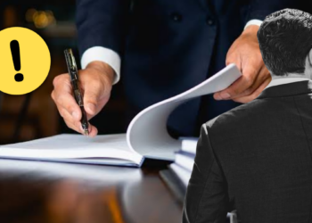 Two Businesspeople: One Signer Writes on a Document As the Other Person Speaks on a Phone; a Bright Yellow Exclamation Badge Indicates a Warning. › La Sierra Madre